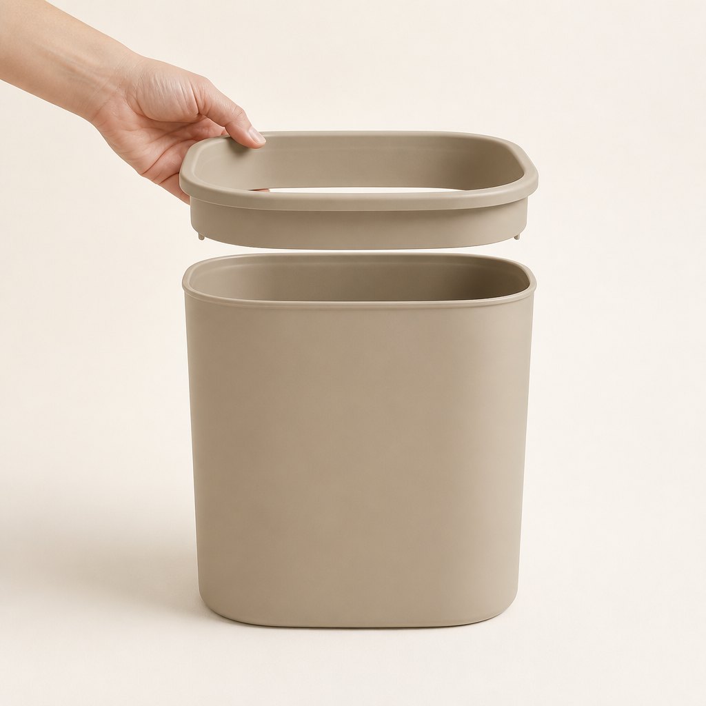 Lidded Cat Litter Waste Bin — Shown in the hand